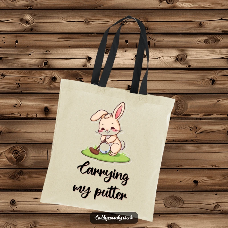 Funny tote bag designed with a playful rabbit character about to putt a golf ball, great for golf outings.